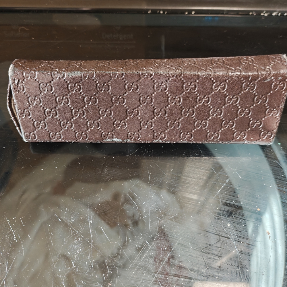 Gucci Sunglasses And Embossed Logo Case